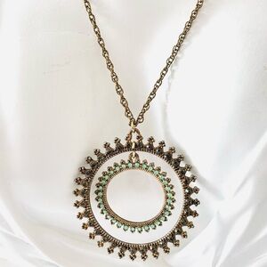 Reanimate by MJ from craft jewelry beautiful rond pendant brass color necklace
